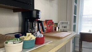 A kitchen counter with a coffee maker, coffee pods, and a sign that reads "COFFEE TIME". - 🔥Warm, Spacious, Free Wine🍷Entire Apt, Self CheckIn! (Dover)