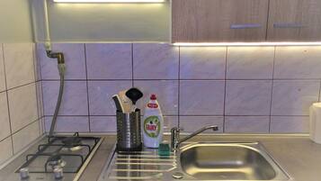 Fridge, electric kettle, cookware/dishes/utensils, kitchen islands