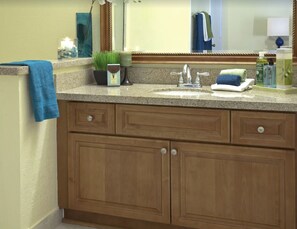 Combined shower/tub, hair dryer, towels, soap