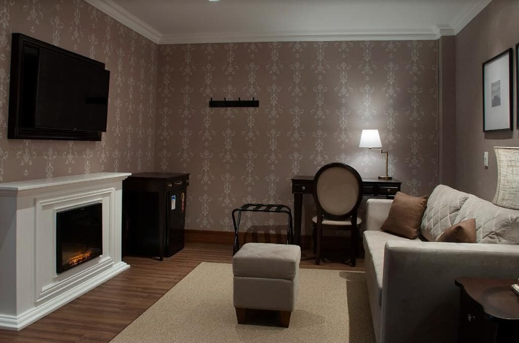 presidential double room | living area | fireplace