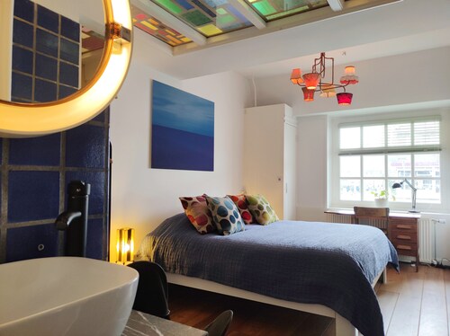 Unique room in former Bathhouse. Free parking