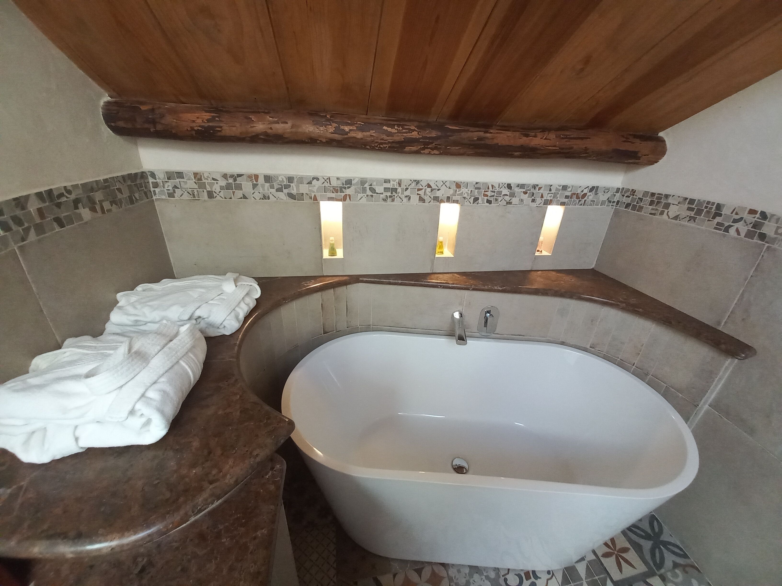 master suit, 1 king bed | bathroom | shower, rainfall showerhead, hair dryer, towels