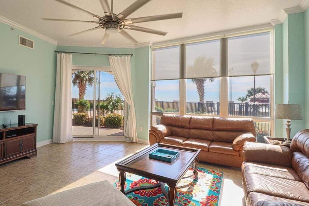Condo, Multiple Beds, Patio, Garden View (Sienna Unit 0107) | Living area | 42-inch flat-screen TV with digital channels