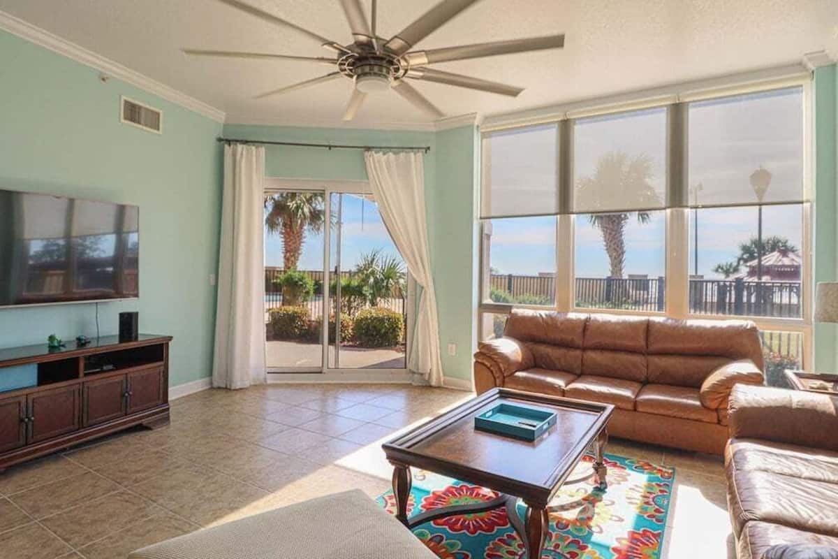 Condo, Multiple Beds, Patio, Garden View (Sienna Unit 0107) | Living area | 42-inch flat-screen TV with digital channels