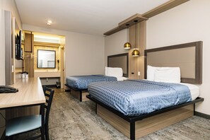 Standard Double Room, 2 Bedrooms | Down comforters, desk, laptop workspace, iron/ironing board (on request) - Hotel Solara Hobby Airport (Houston)