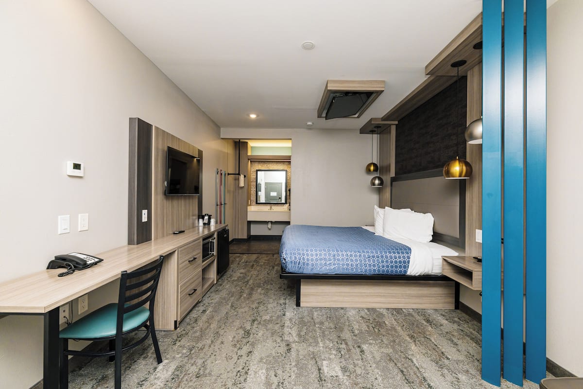 Premium bedding, down comforters, desk, laptop workspace