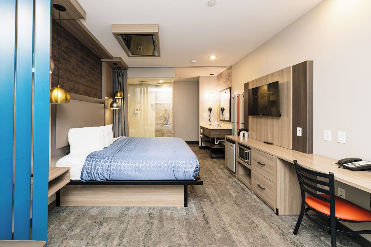 Premium bedding, down comforters, desk, laptop workspace