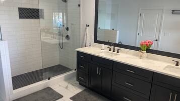 Bathtub, hair dryer, towels, soap