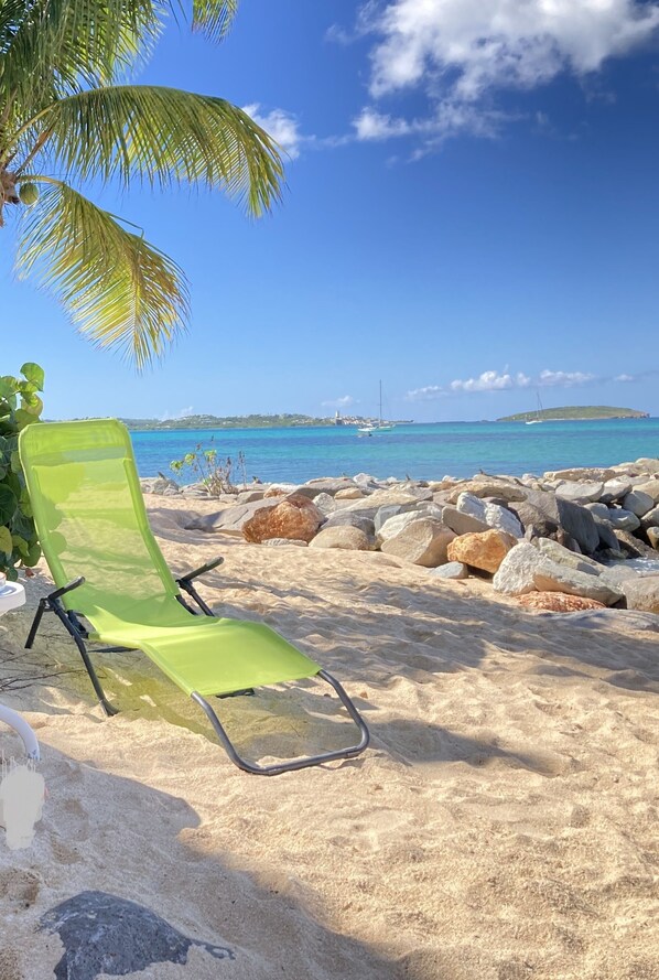 On the beach, sun-loungers, beach towels