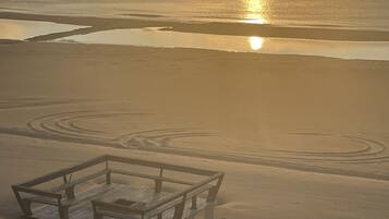 On the beach, sun loungers