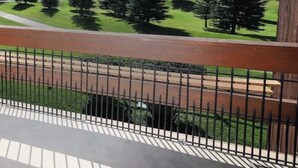 A balcony with a view of a park, trees, and mountains. - Ultimate Beaver Creek Condo: 3 BED - 3 BATH condo SLEEPS 8 with 6 beds (Avon)