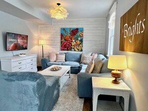 Smart TV, fireplace, books