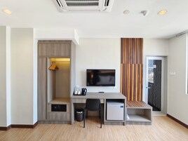 Family Quadruple Room | Minibar, desk, blackout drapes, iron/ironing board