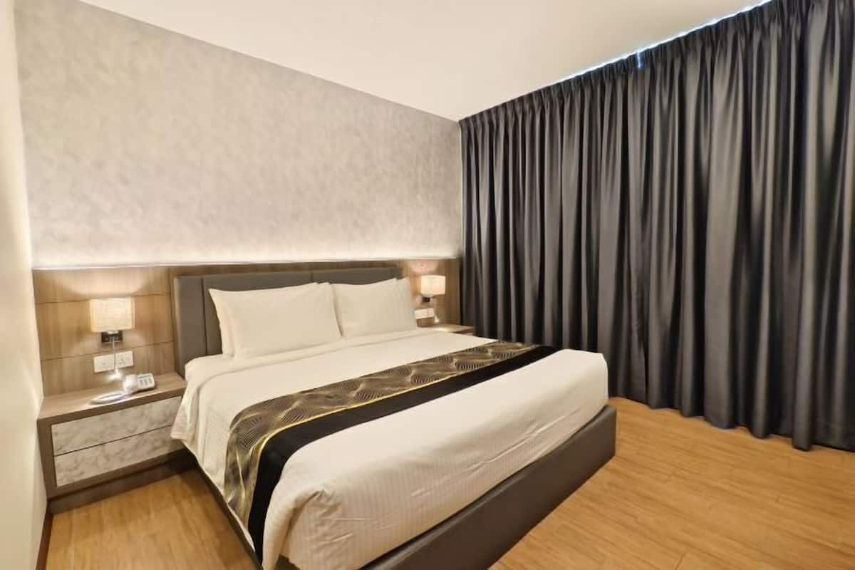 Minibar, desk, blackout curtains, iron/ironing board