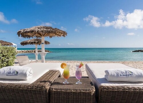 Pool Front Villa in Exclusive Palm Cay Beachfront Resort- A cozy Retreat. 