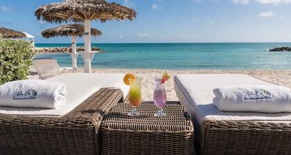 Pool Front Villa in Exclusive Palm Cay Beachfront Resort- A cozy Retreat.