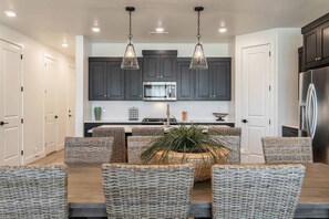 Townhome, 4 Bedrooms | Private kitchen | Fridge, oven, coffee/tea maker, toaster