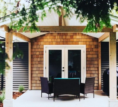 Spacious and modern 2 bedroom 2 bathroom cottage with private yard.