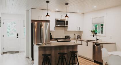 Spacious and modern 2 bedroom 2 bathroom cottage with private yard.