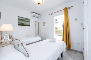 2 dormitorios, tabla de planchar con plancha, wifi gratis y ropa de cama