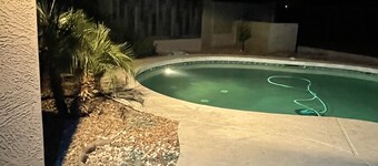 Lovely bedroom beautifully decorated with a smart tv .