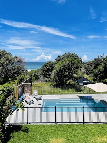Absolute beachfront holiday home with private heated pool