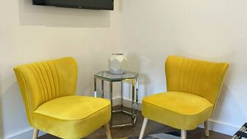 Hexagon Room | Desk, laptop workspace, blackout curtains, iron/ironing board