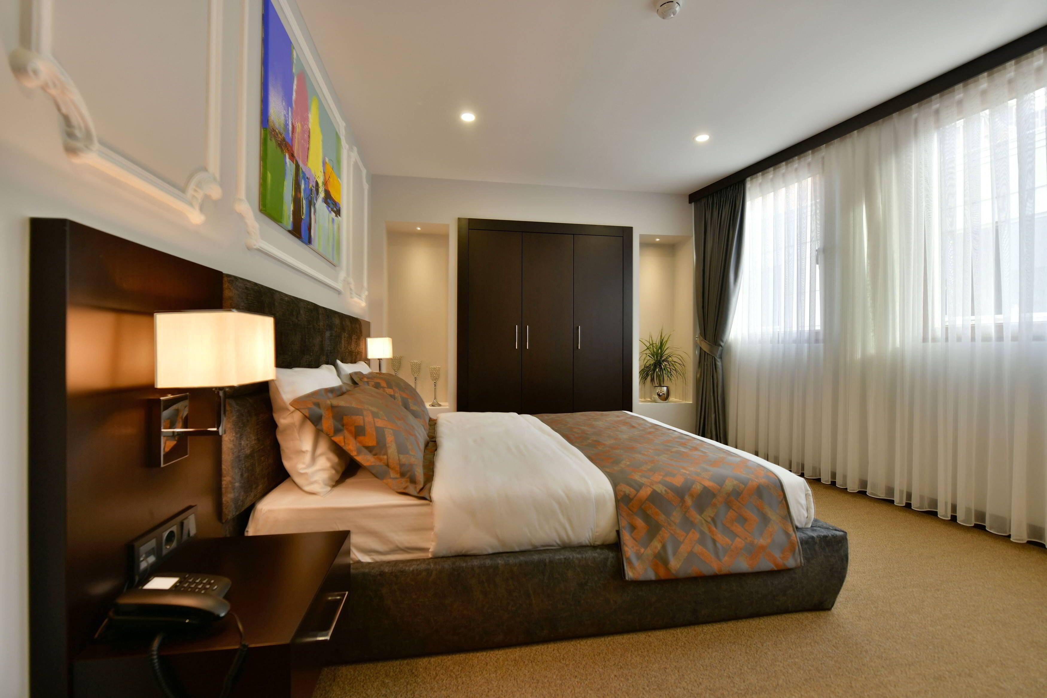 superior double room | premium bedding, minibar, in-room safe, laptop workspace