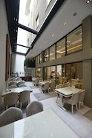 Breakfast, lunch, dinner served; local and international cuisine