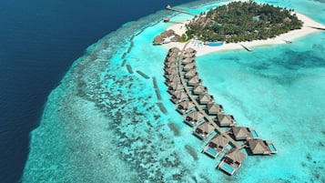 Escape to a secluded island paradise with a tranquil atmosphere and lush surroundings.