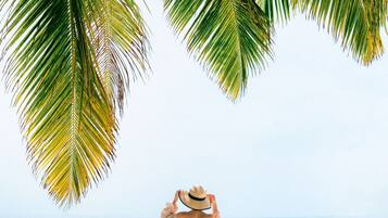 Private beach, white sand, sun-loungers, beach umbrellas