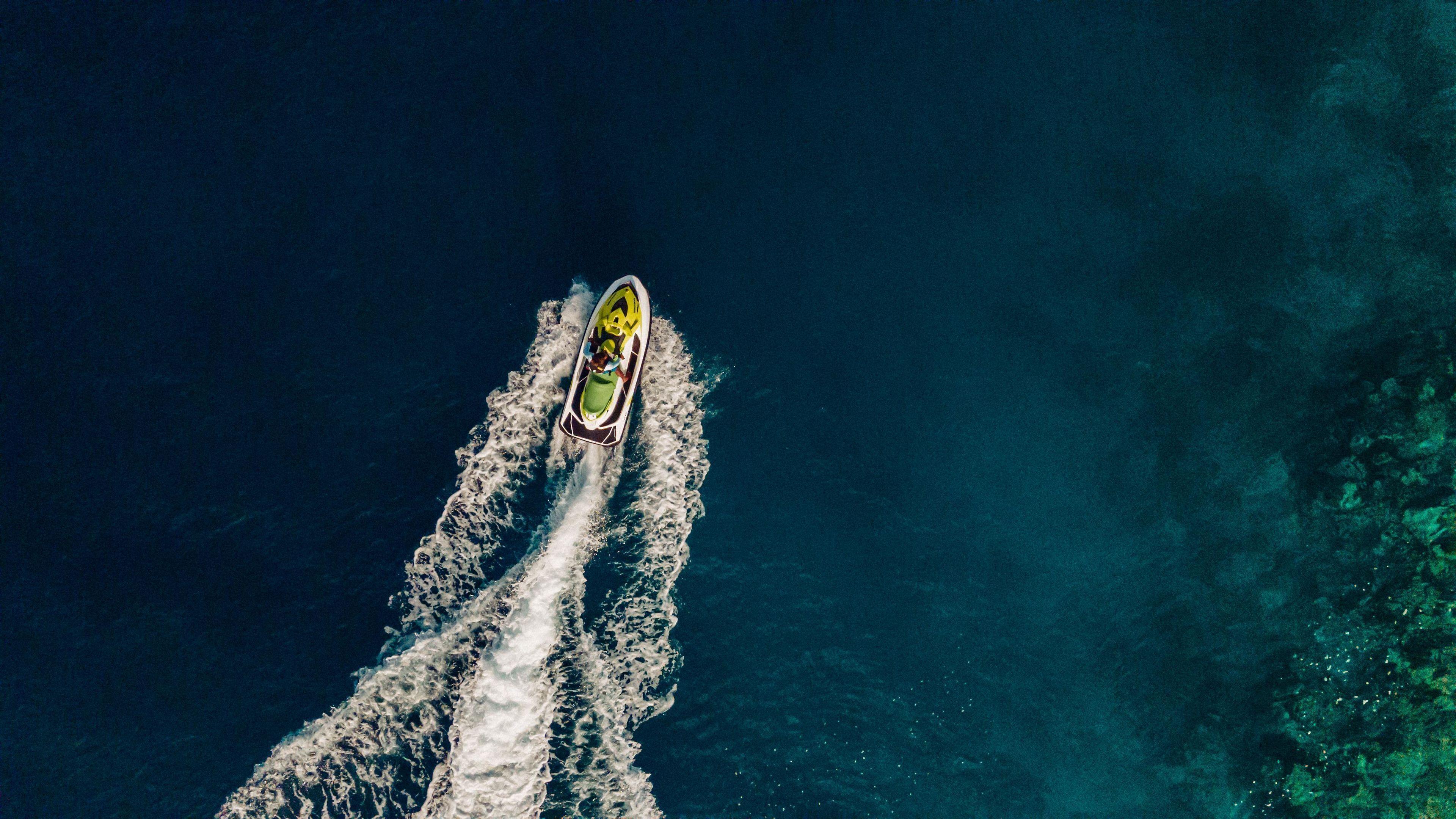 A jet ski creating a wake in the ocean.