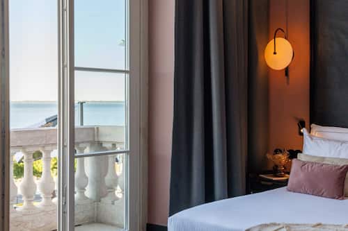 Double Room, Balcony, River View | Minibar, in-room safe, desk, laptop workspace