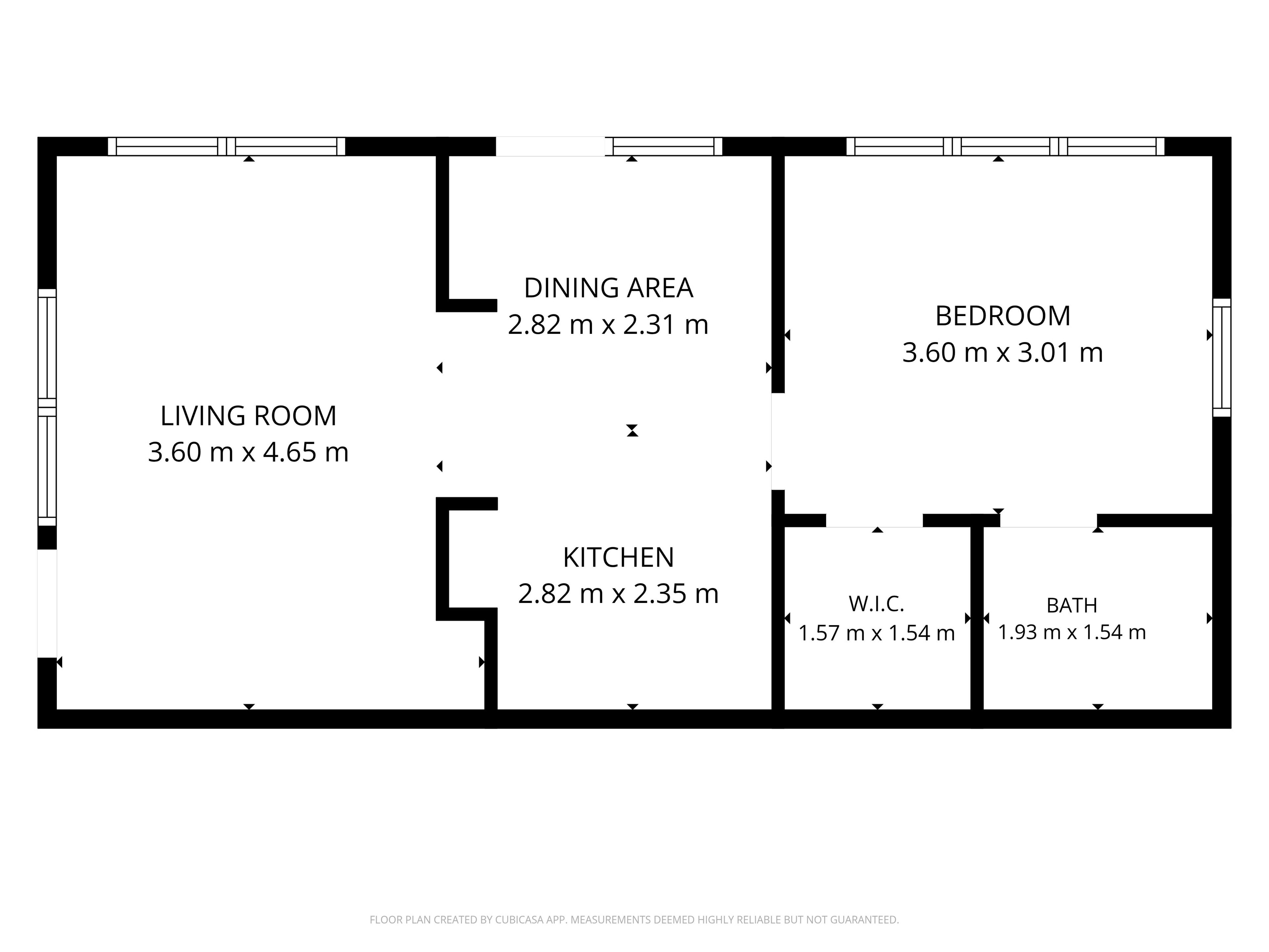 A floor plan with a living room, dining area, kitchen, bedroom, W.I.C., and bath.