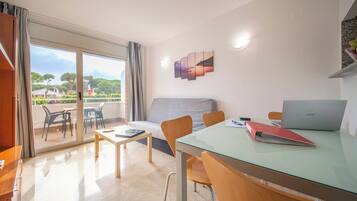 Superior Duplex | Living area | Flat-screen TV, printers