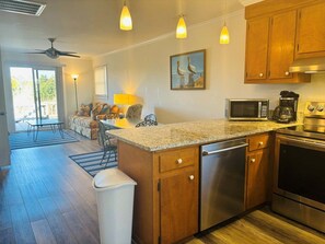 Fridge, microwave, oven, dishwasher - Stay at Plan Beach, a cozy 2-bedroom duplex in beautiful Holden Beach, NC. (Holden Beach)