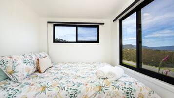 1 bedroom, desk, bed sheets