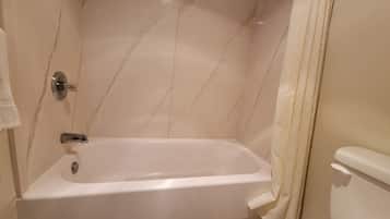 Combined shower/bathtub, hair dryer, towels, soap