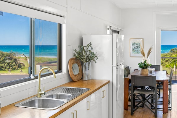 Enjoy ocean views from the kitchen window, where you can cook and dine with a view.