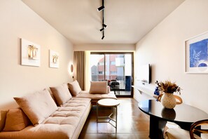 Executive Apartment | Living area | 49-inch Smart TV with satellite channels, TV - Pavo Art Hotel (Heraklion)