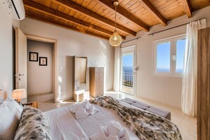 2 dormitorios, tabla de planchar con plancha, cuna de viaje