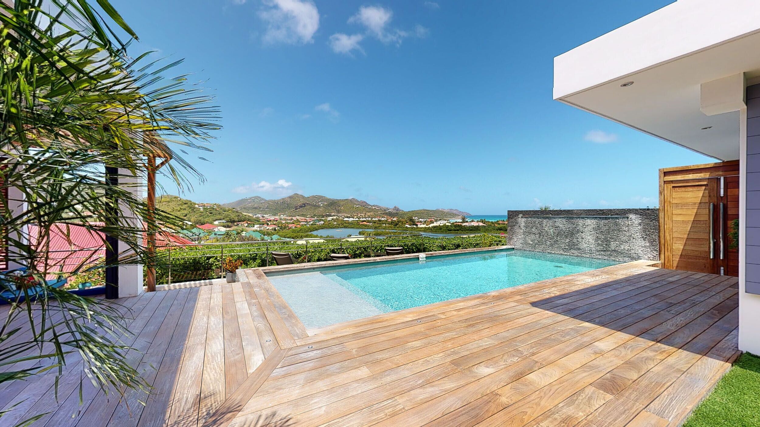 A heated pool, pool loungers