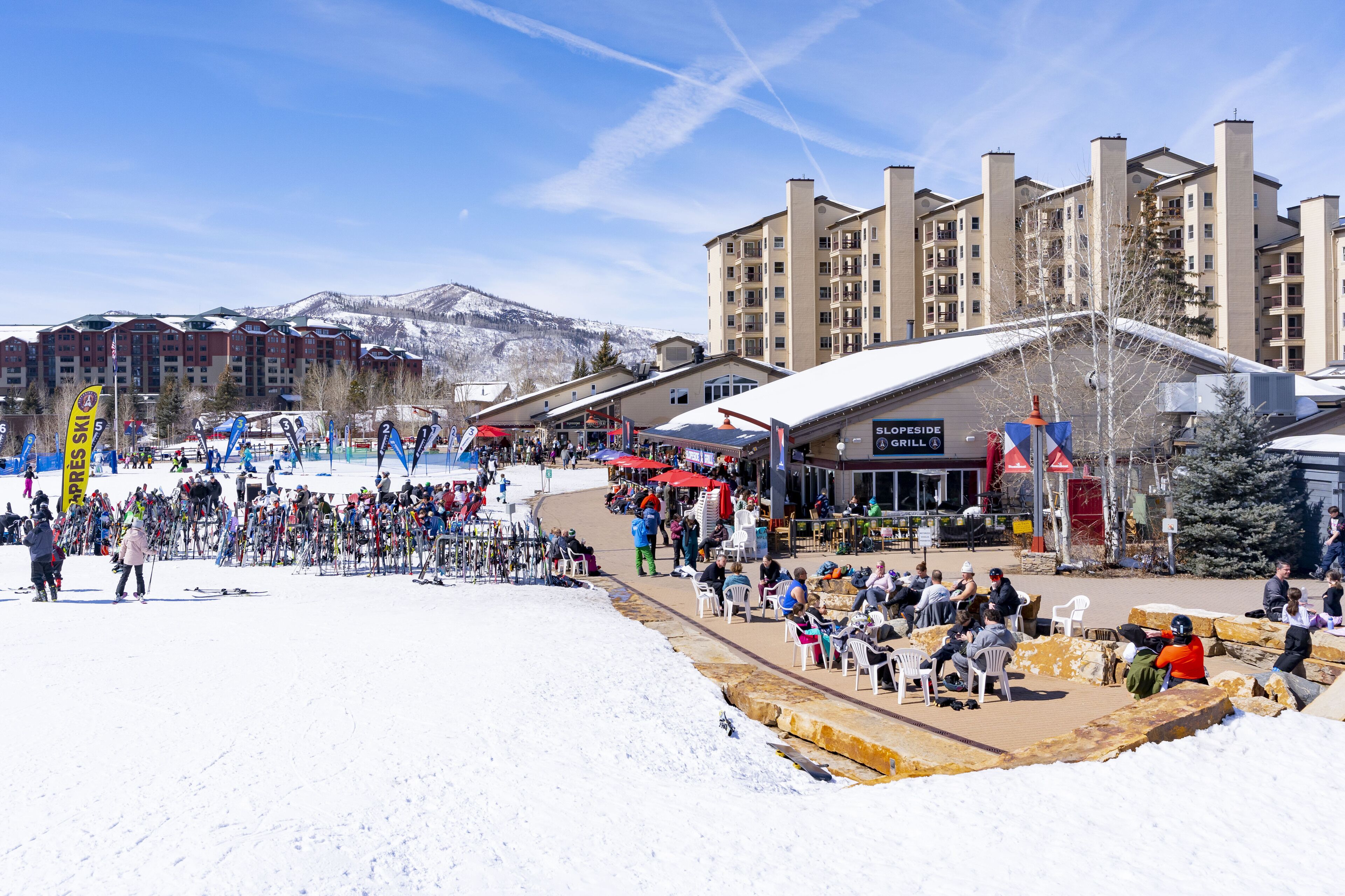 A ski resort with multiple buildings, a ski lift area, and a restaurant named 'SLOPESIDE GRILL'.
