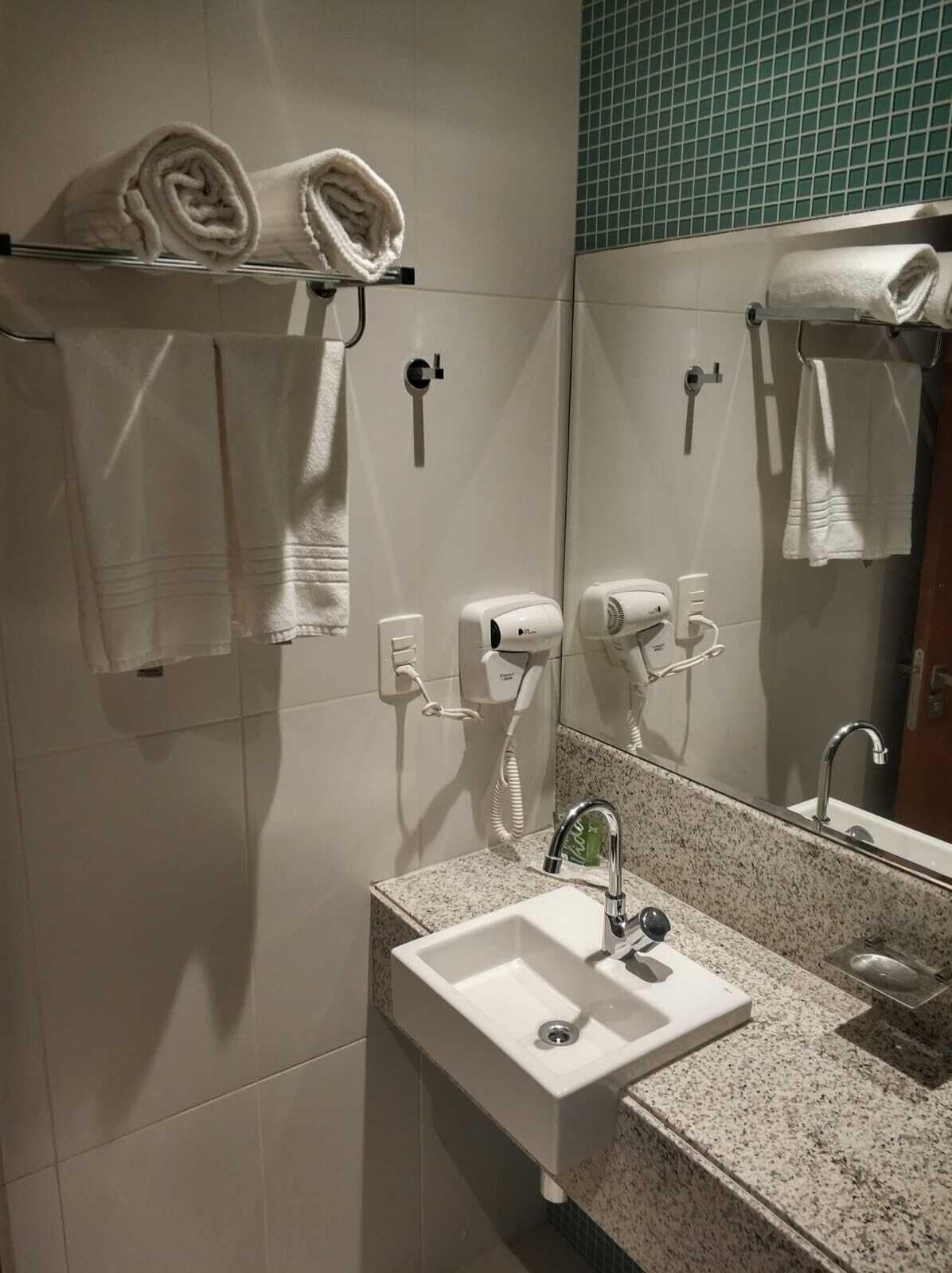 executive twin room | bathroom | hair dryer, towels, soap, shampoo