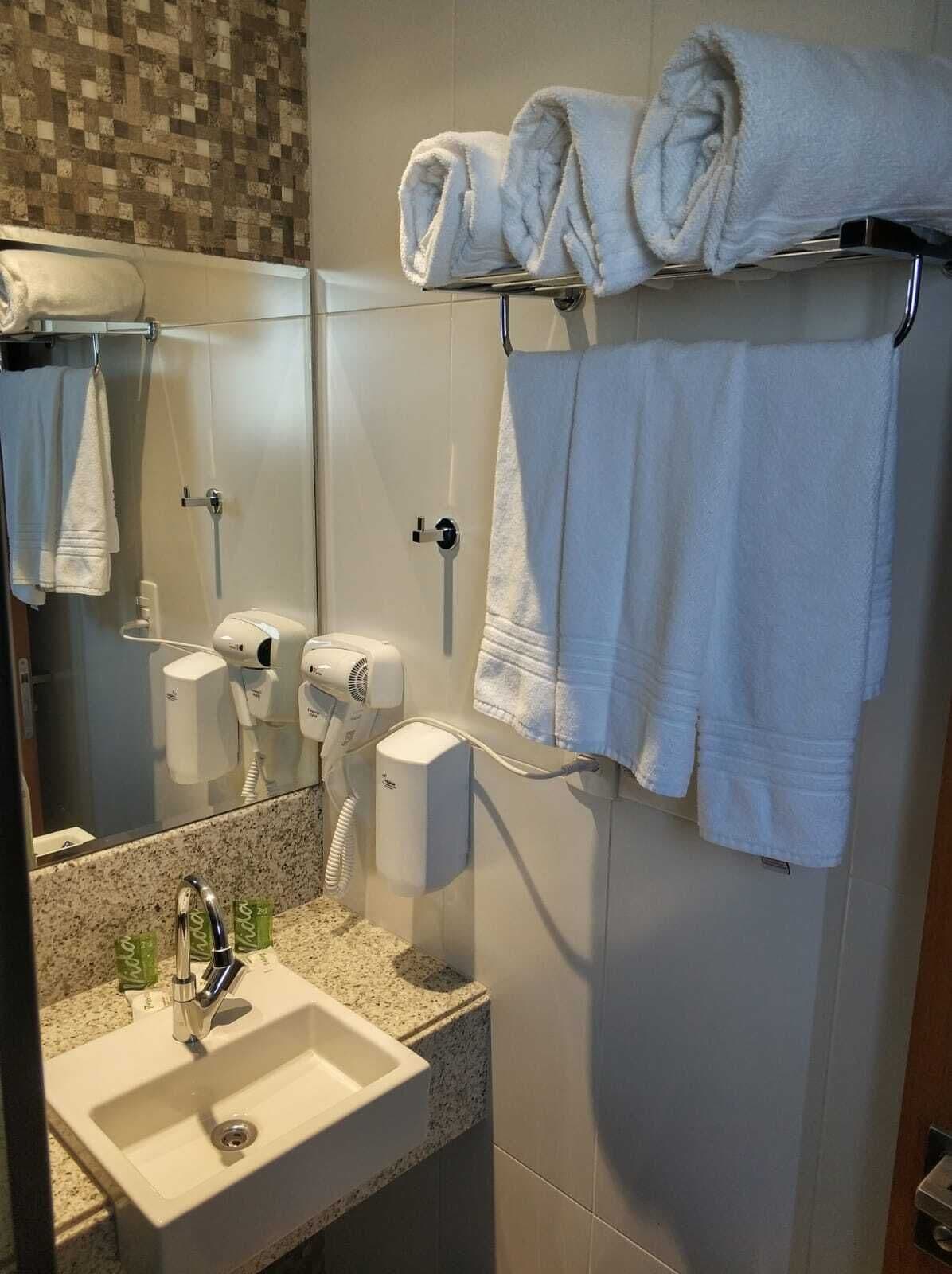 executive triple room | bathroom | hair dryer, towels, soap, shampoo
