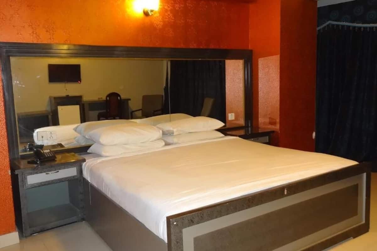 Habitación Deluxe con 1 cama doble o 2 individuales | Wifi gratis y ropa de cama
