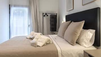 2 dormitorios, tabla de planchar con plancha, Internet y ropa de cama