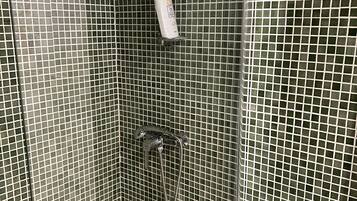 Shower, towels, toilet paper