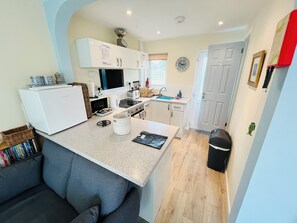 Fridge, microwave, oven, stovetop - 2 Bedroom Bungalow SV58, Seaview, Isle of Wight, Dog Friendly, free wifi (Seaview)