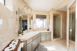 Combined shower/tub, hair dryer, towels, soap
